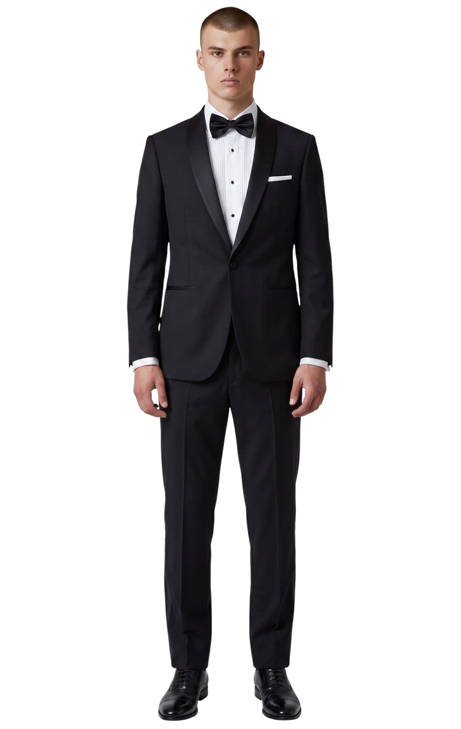 Model wearing a Cosiani slim fit black wool and cashmere tuxedo with a satin shawl lapel and matching bowtie.