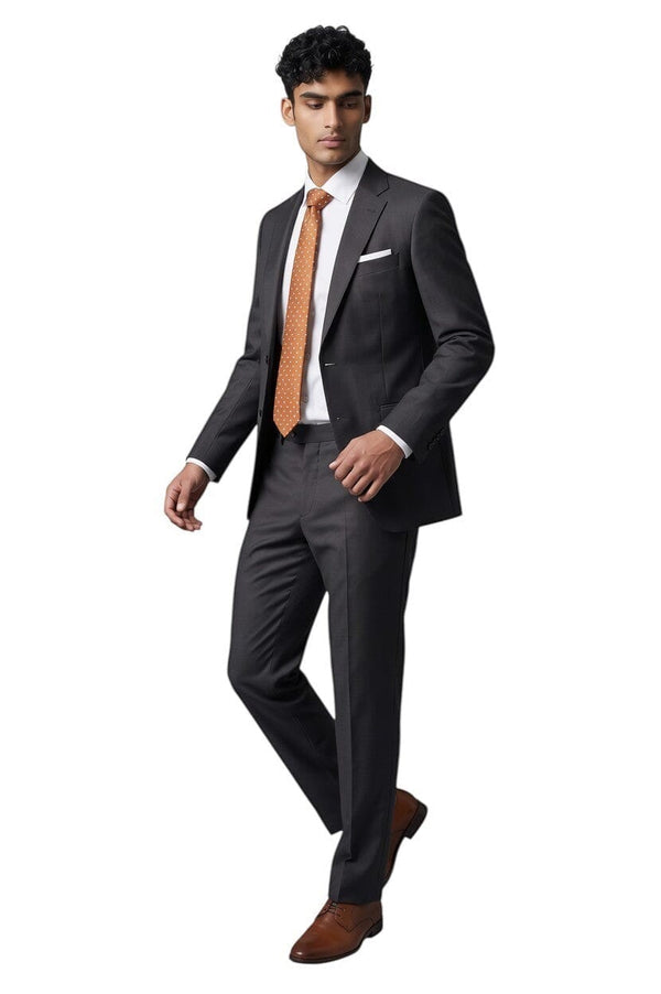 Cosiani slim fit charcoal grey wool & silk blend men's suit with a white pocket square and orange polka dot tie.